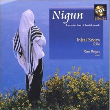 The cover to Inbal Segev's Album "Nigun" featuring a person in a white head covering with a striped shall overlooking a blue valley.